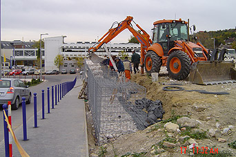 GABION retaining wall supporting car park at OPEL MAXABO Kft.