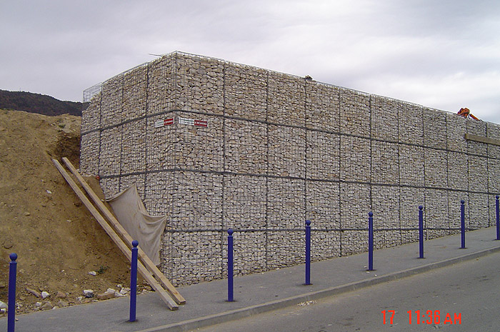 GABION retaining wall supporting car park at OPEL MAXABO Kft.